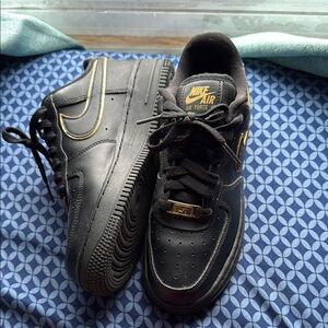 Nike Air Force 1 Black and Gold Shoes